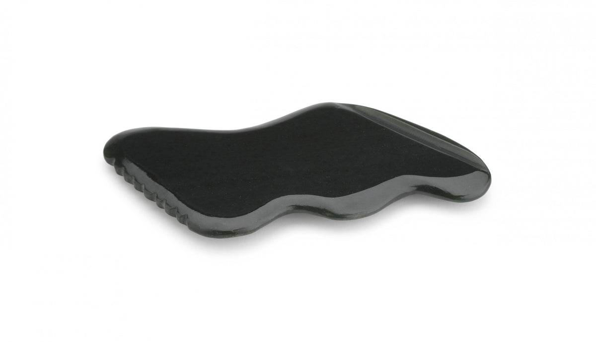 Side view of the CJB Pro Nephrite gua sha showing its patented curved shape