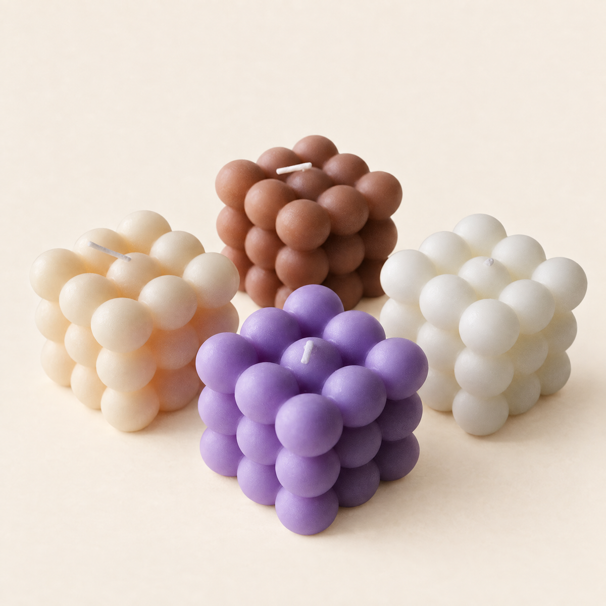 Hand-poured soy bubble candles in white, ivory, lavender and brown