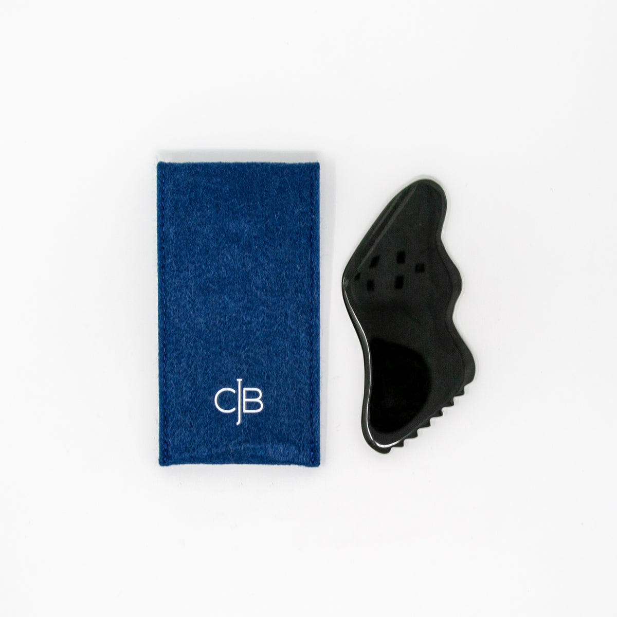 CJB Pro Nephrite gua sha with its protective travel pouch