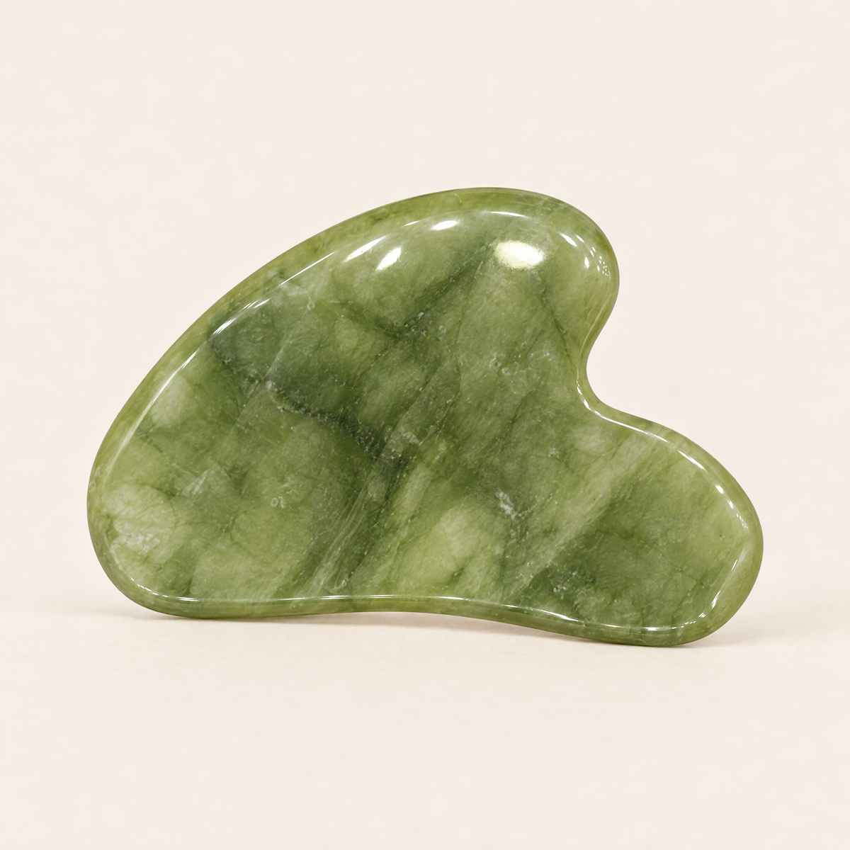 Green jade heart-shaped gua sha tool