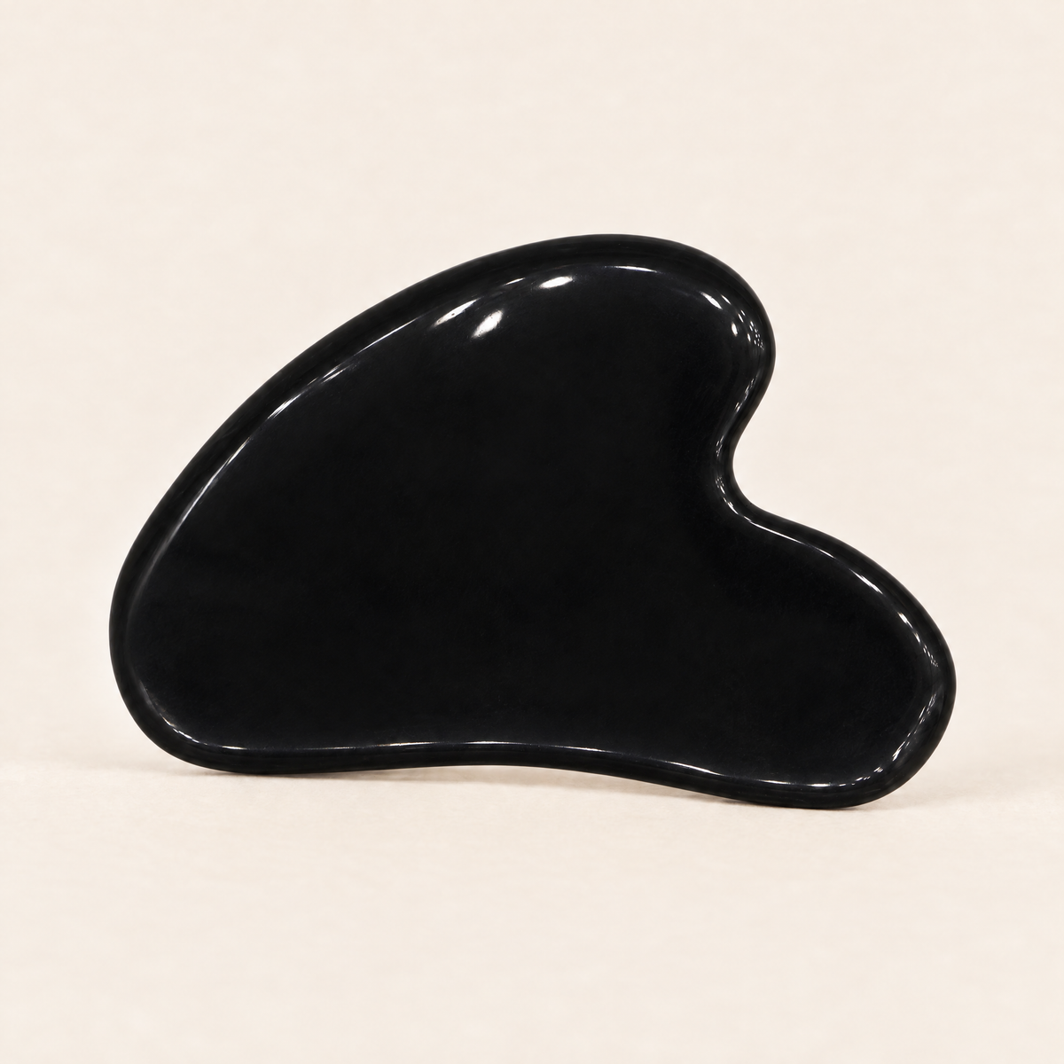 Black obsidian heart-shaped gua sha tool