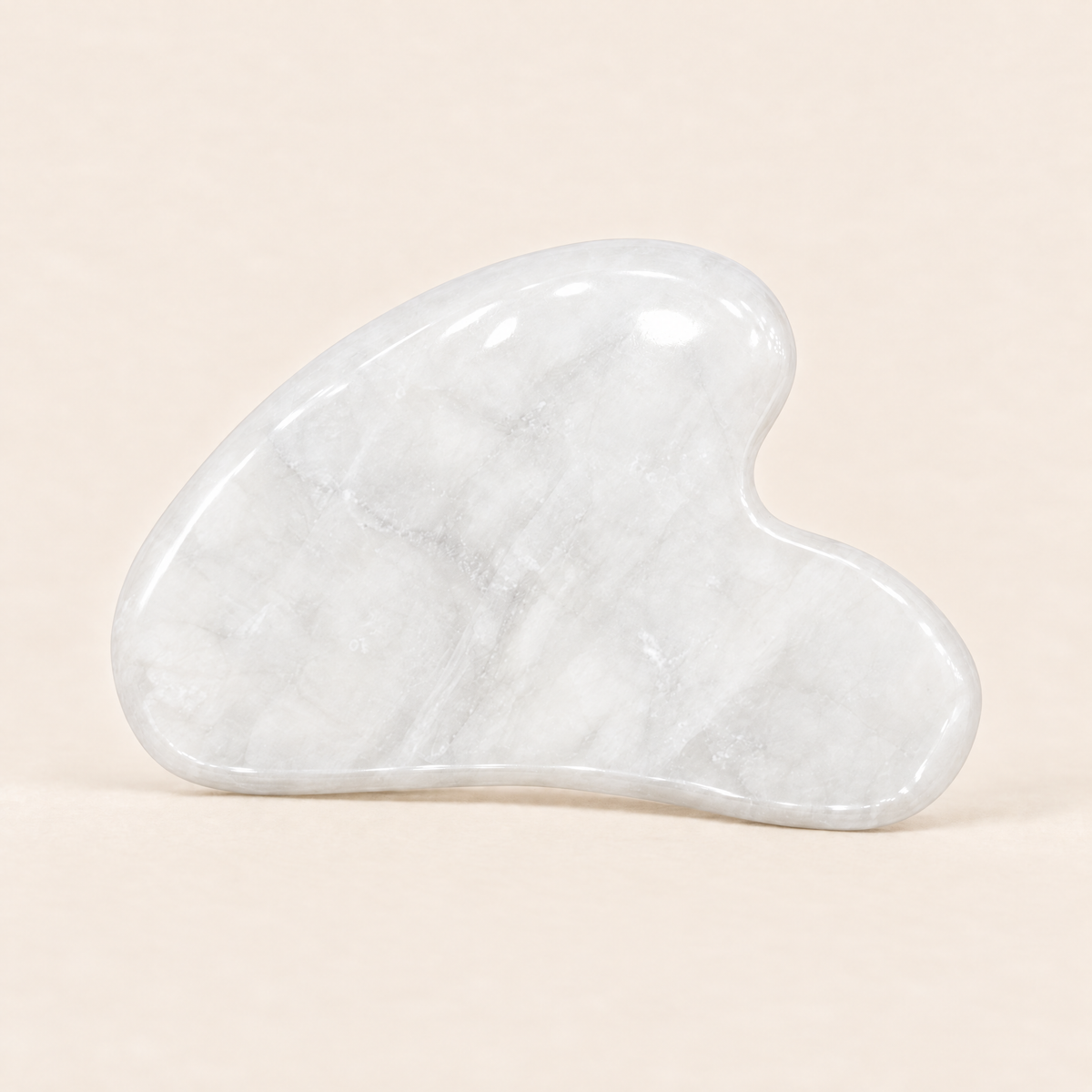 White jade heart-shaped gua sha tool