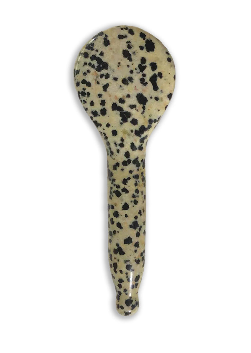 Dalmatian stone sculpting spoon showing its beveled edge
