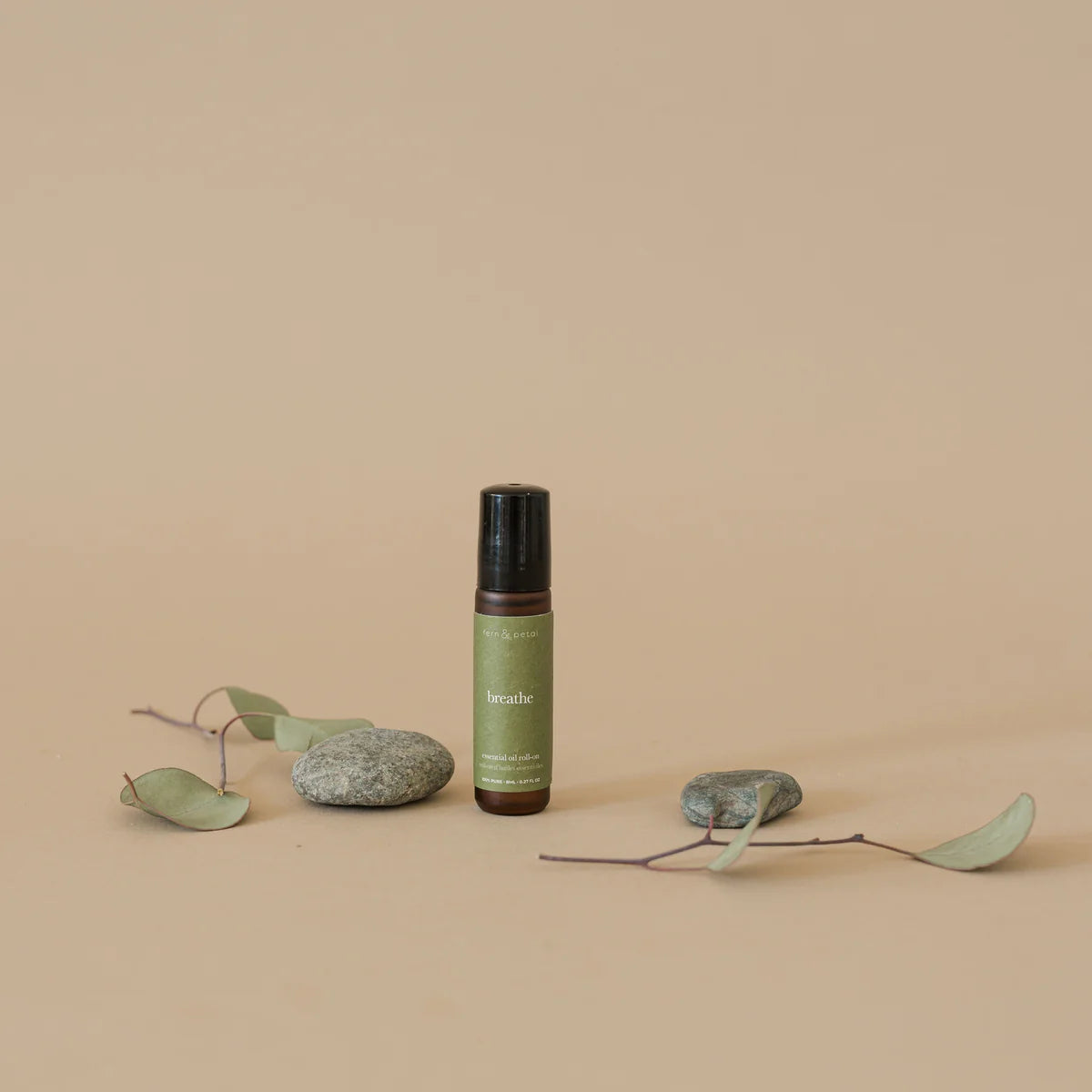 Breathe Essential Oil Roller by Fern & Petal, lifestyle view 1
