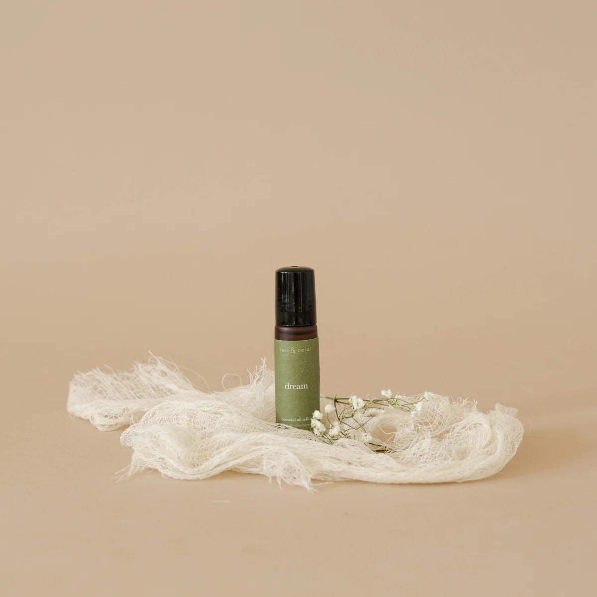 Dream Essential Oil Roller by Fern & Petal, lifestyle view