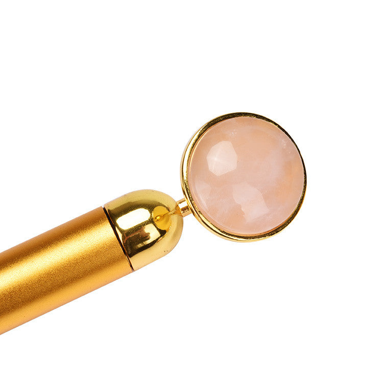 Close-up of the rose quartz head on the CJB vibrational wand