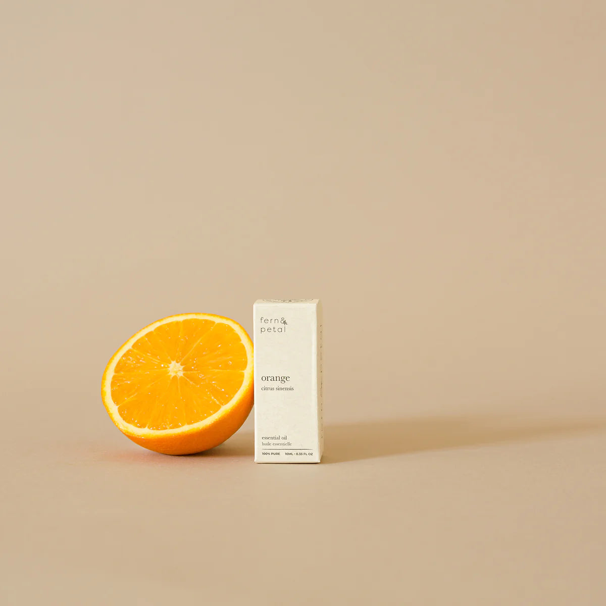 Orange Essential Oil by Fern & Petal, lifestyle view