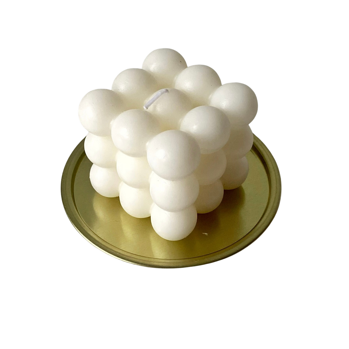 Bubble candle on a gold heat-safe tray